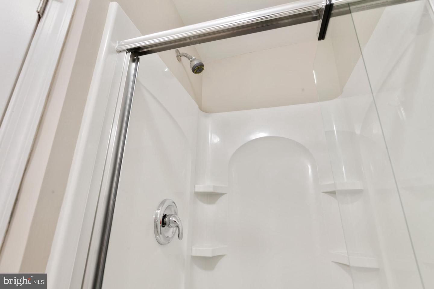 9418 Paragon Court Owings Mills, MD 21117 - Photo 38 of 42 a bathroom with a shower