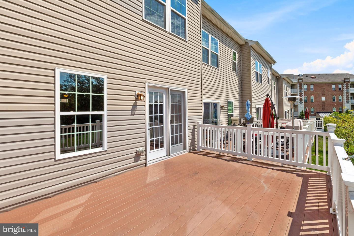 9418 Paragon Court Owings Mills, MD 21117 - Photo 42 of 42 a view of a house with wooden floor and a large window