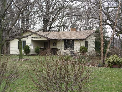 1900 Pine Bluff Road Morris, IL 60450 - Photo 1 of 1 a front view of a house with garden