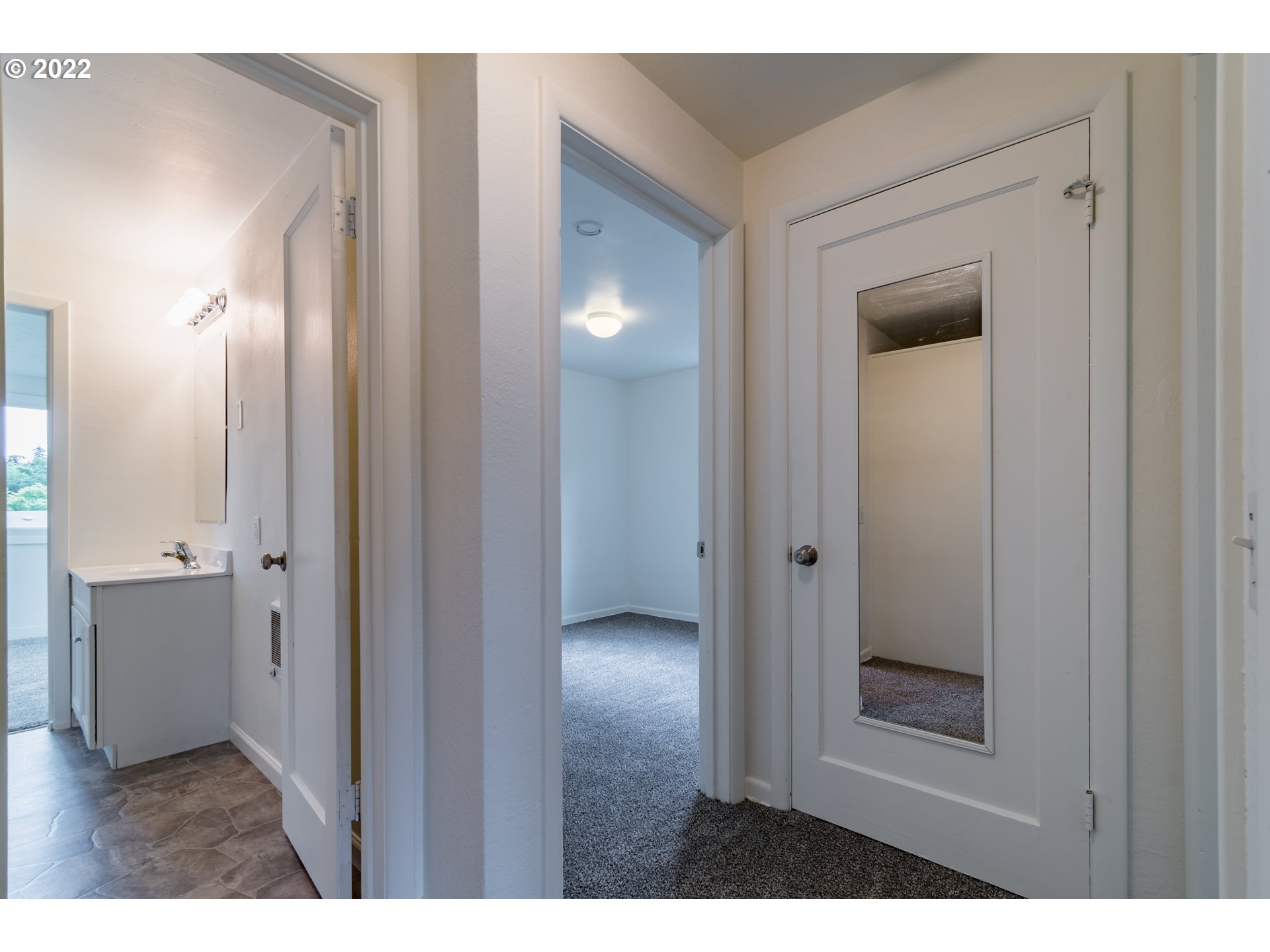 2175 City View Street Eugene, OR 97405 - Photo 15 of 32 a view of a bathroom from a hallway