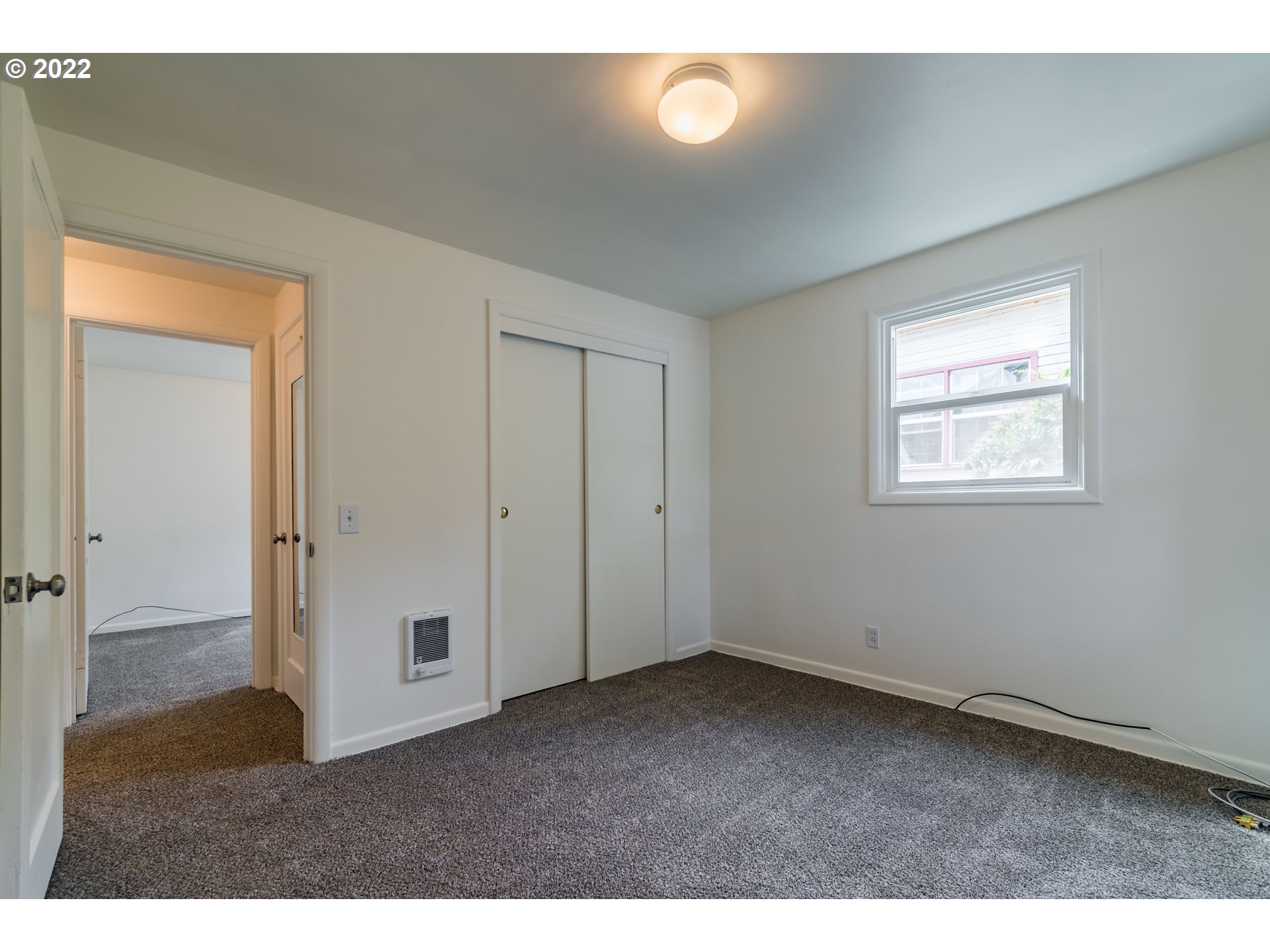 2175 City View Street Eugene, OR 97405 - Photo 17 of 32 a view of an empty room with a window