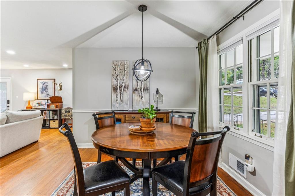 2592 Woodacres Road Northeast Atlanta, GA 30345 - Photo 6 of 27 a view of a dining room with furniture window and wooden floor