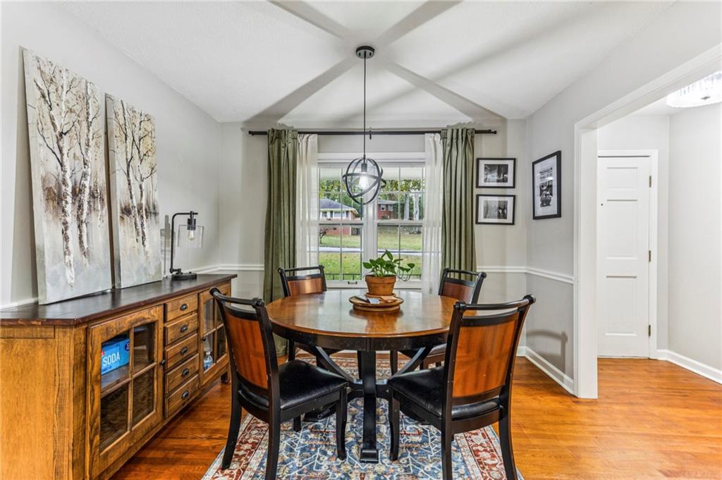 2592 Woodacres Road Northeast Atlanta, GA 30345 - Photo 7 of 27 a view of a dining room with furniture window and wooden floor