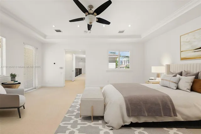 a kitchen with stainless steel appliances kitchen island granite countertop a refrigerator and a stove top oven