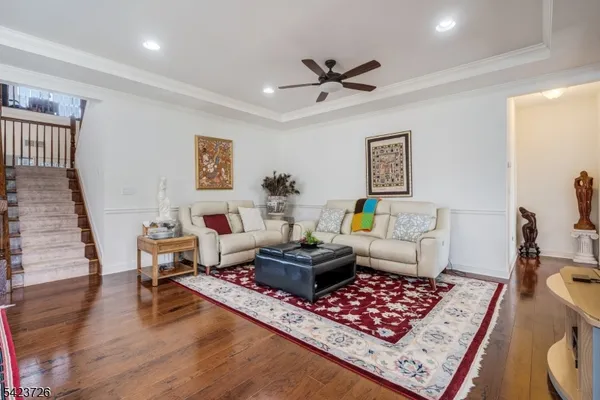 a front view of a house with a yard and porch