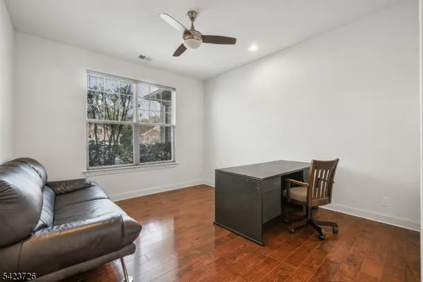 an aerial view of a house with swimming pool