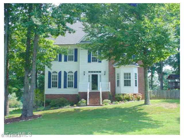 110 Harper Ridge Court Clemmons, NC 27012 - Photo 1 of 16 Exterior Front. Nestled on a large, corner, wooded lot.