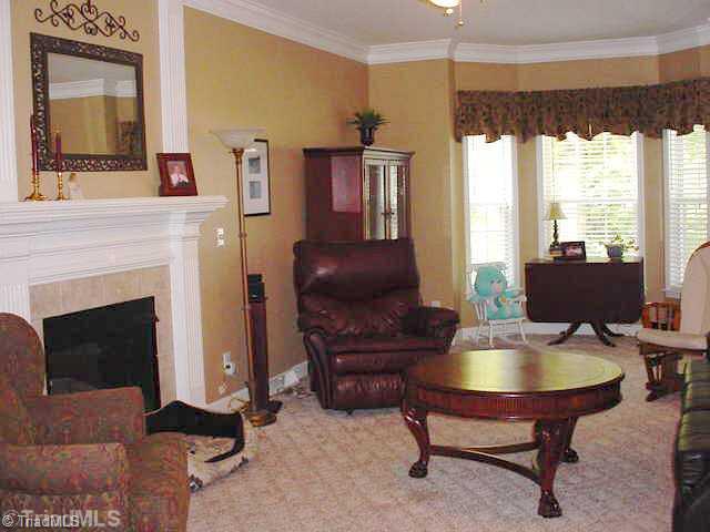 110 Harper Ridge Court Clemmons, NC 27012 - Photo 2 of 16 Living Room. Large Living Room has bay window and fireplace with gas logs.