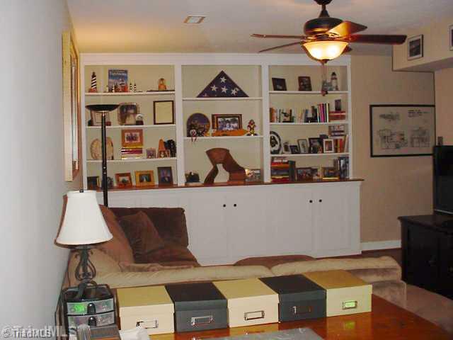 110 Harper Ridge Court Clemmons, NC 27012 - Photo 13 of 16 Den/Family/Great Room. LL Den with wall of built-ins.