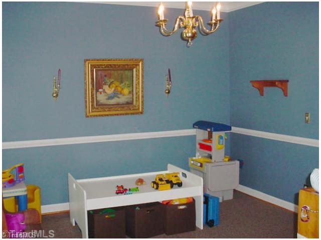 110 Harper Ridge Court Clemmons, NC 27012 - Photo 6 of 16 Dining Room. Formal Dining Room is currently being used as a playroom. Hardwood flooring under temporary carpeting,