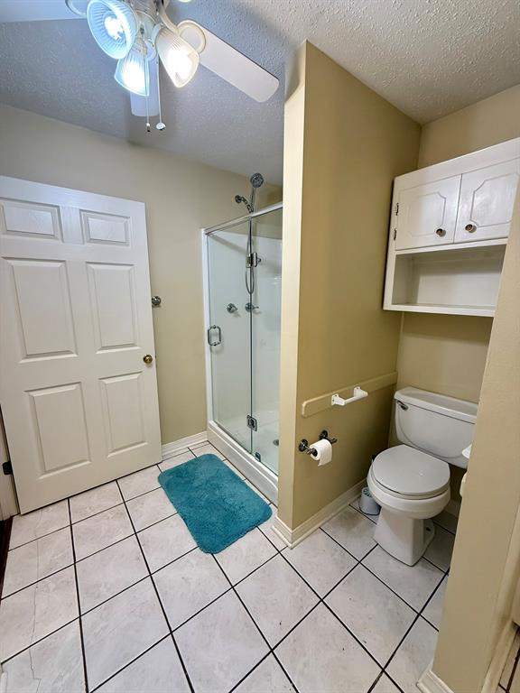 11535 Timber Ridge Drive Keithville, LA 71047 - Photo 16 of 39 a bathroom with a toilet and a shower
