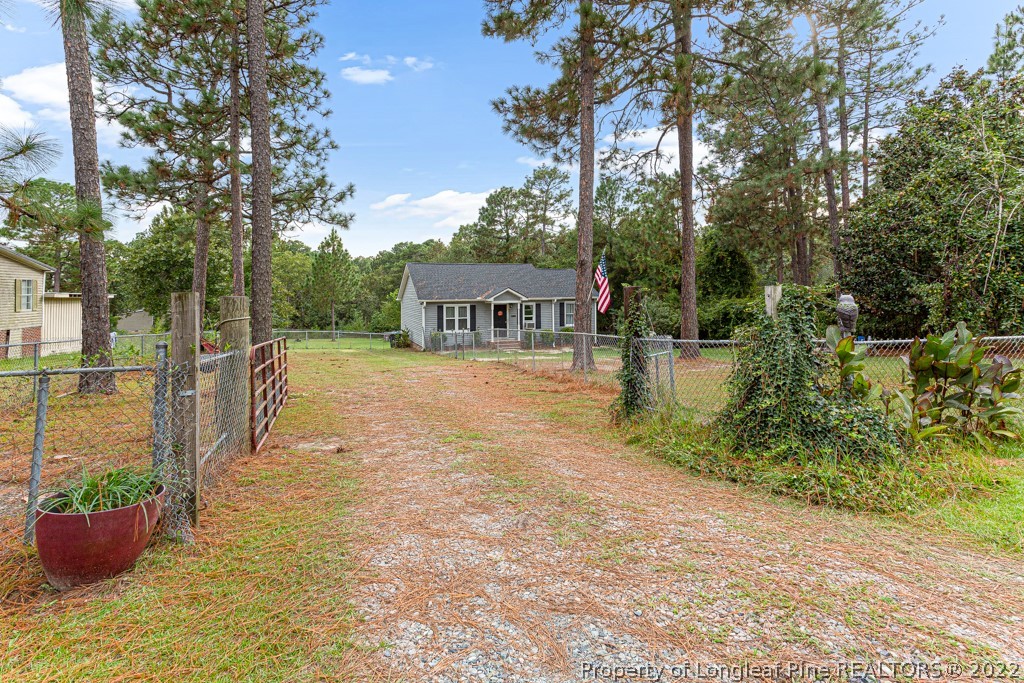 400 Evans Drive Cameron, NC 28326 - Photo 2 of 15 a view of swimming pool with outdoor seating and plants