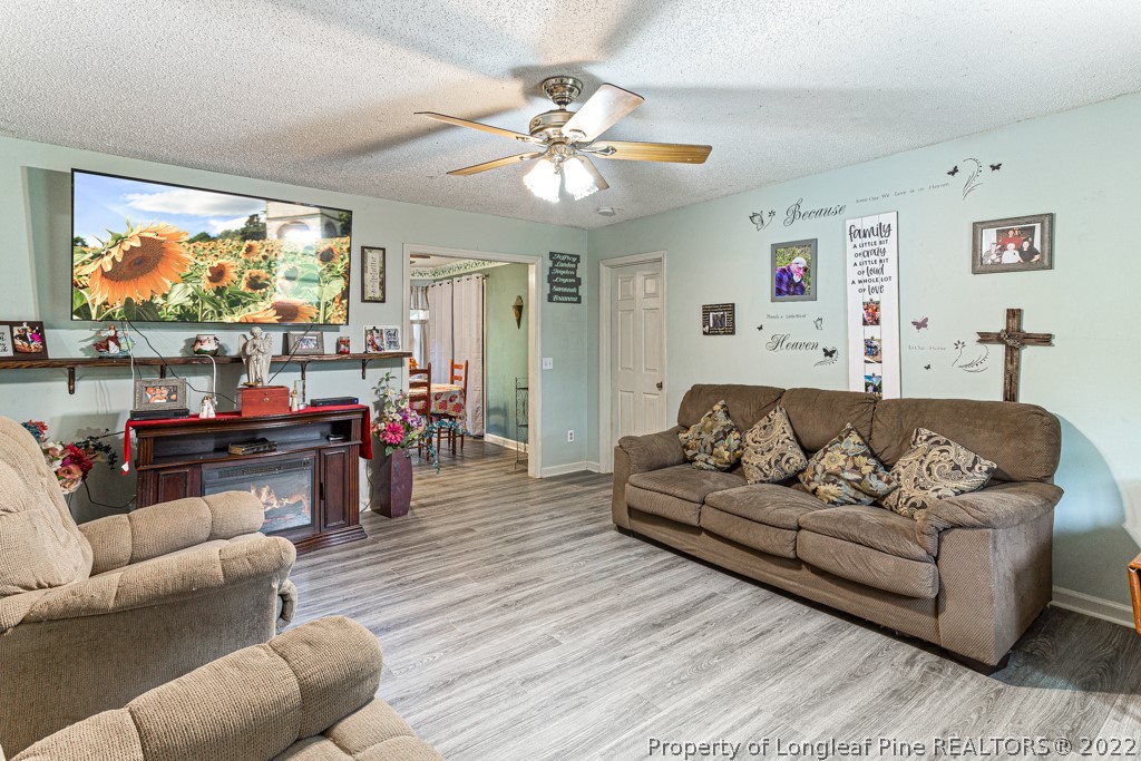 400 Evans Drive Cameron, NC 28326 - Photo 6 of 15 a living room with furniture and a large window