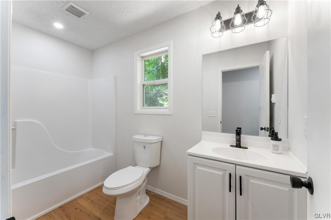 4121 Romeo Road Tobyhanna, PA 18466 - Photo 13 of 24 a bathroom with a sink toilet and shower