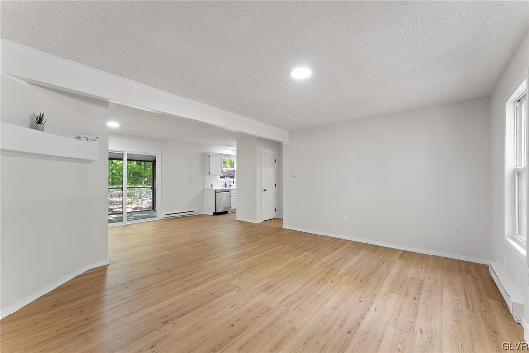 4121 Romeo Road Tobyhanna, PA 18466 - Photo 3 of 24 a view of a room with wooden floor and window
