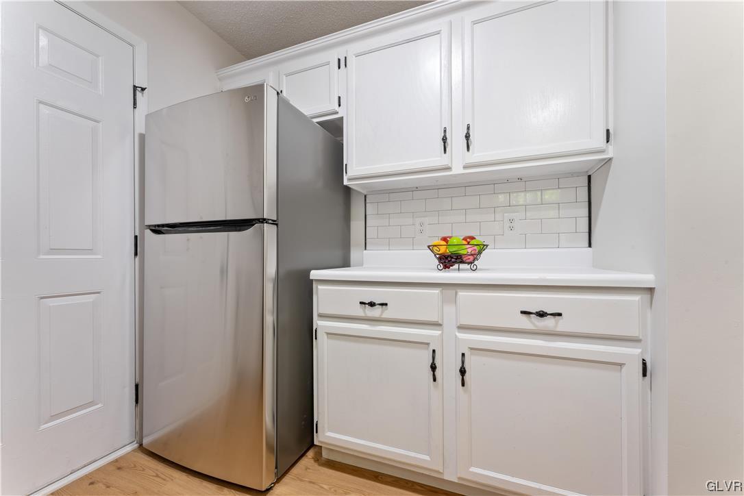 4121 Romeo Road Tobyhanna, PA 18466 - Photo 9 of 24 a white refrigerator freezer sitting in a kitchen