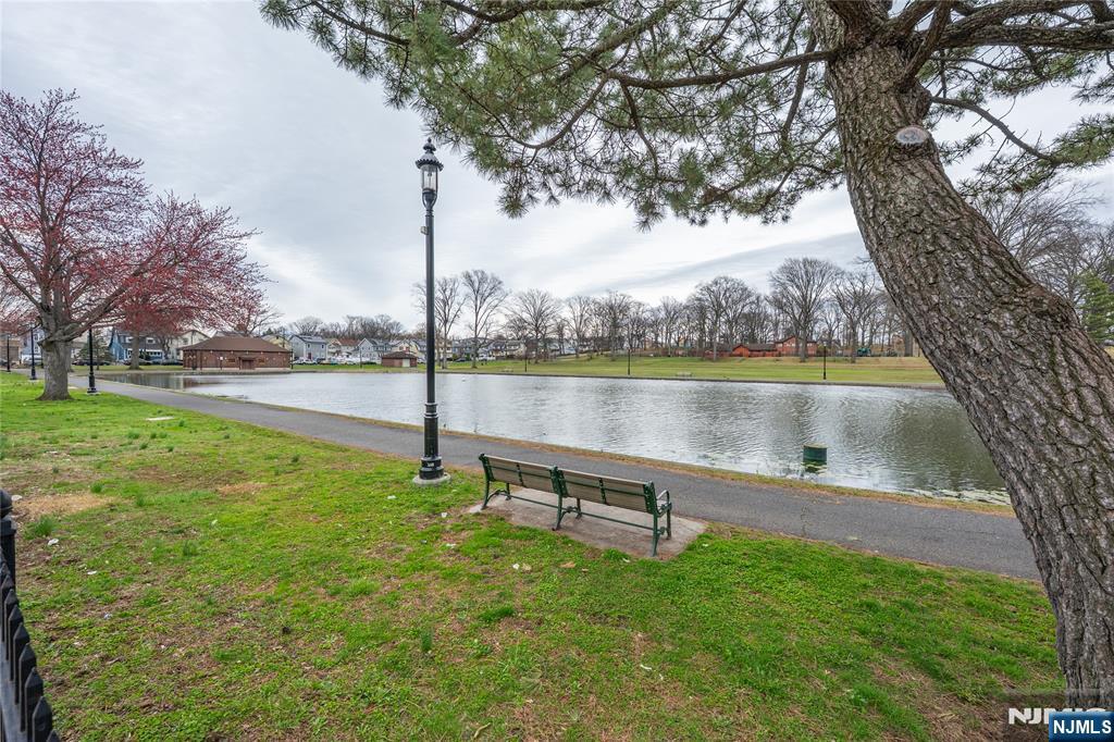 153 Augusta Street Irvington, NJ 07111 - Photo 3 of 26 a view of a park with large trees