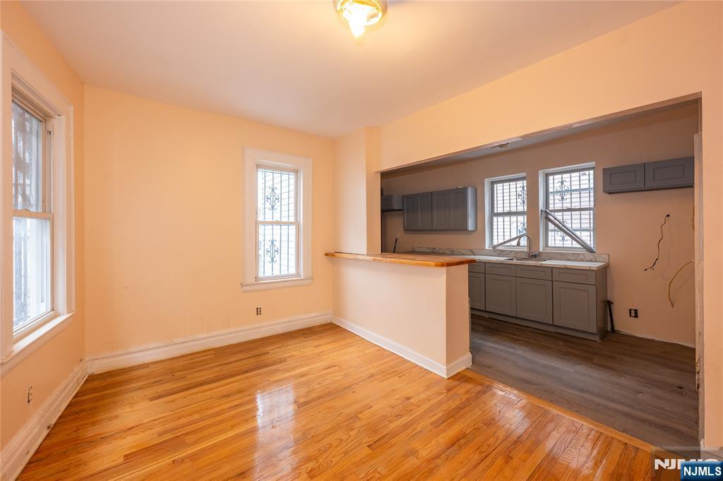 153 Augusta Street Irvington, NJ 07111 - Photo 9 of 26 a view of a house with a kitchen and a window