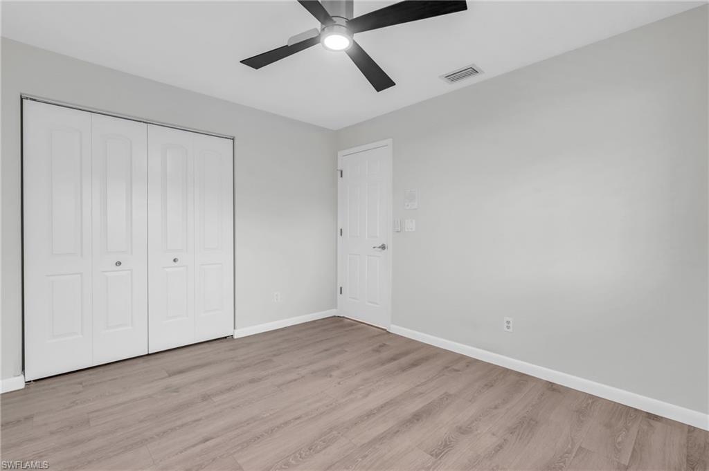 102 Muirfield Circle Naples, FL 34113 - Photo 27 of 43 a view of an empty room