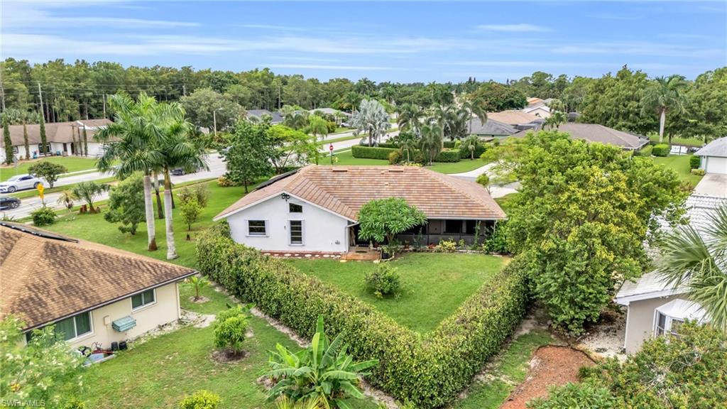 102 Muirfield Circle Naples, FL 34113 - Photo 36 of 43 an aerial view of a house
