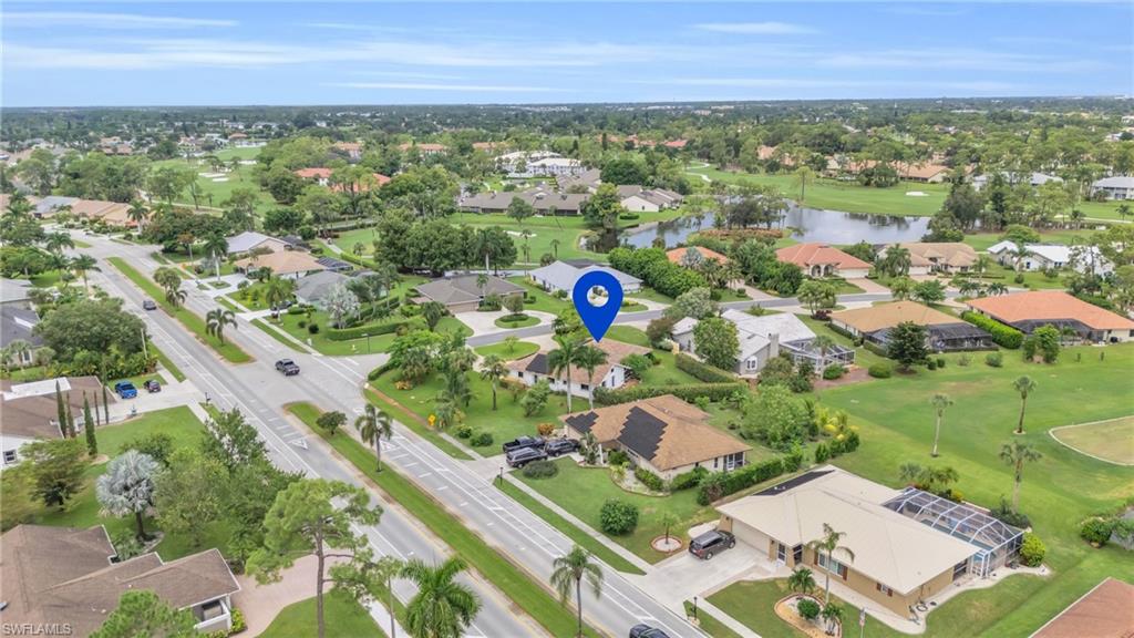 102 Muirfield Circle Naples, FL 34113 - Photo 37 of 43 an aerial view of multiple house