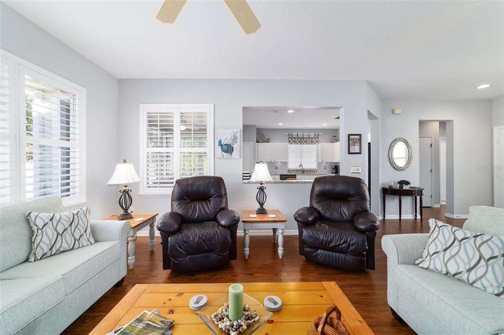 13146 Southeast 93rd Terrace Road Summerfield, FL 34491 - Photo 19 of 63 a living room with furniture and a large window