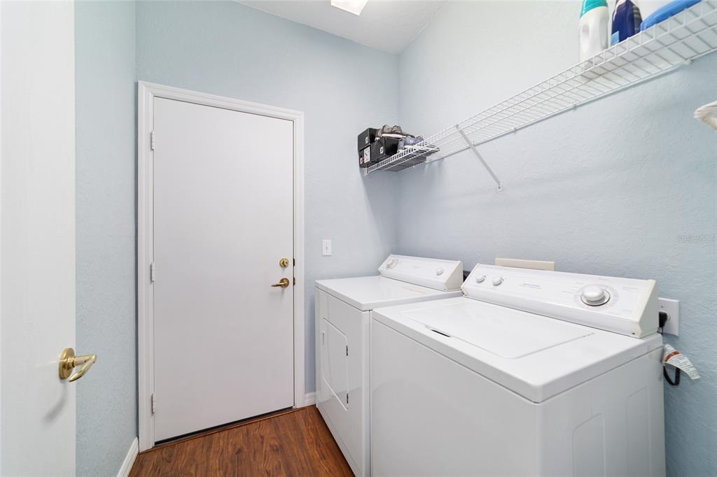 13146 Southeast 93rd Terrace Road Summerfield, FL 34491 - Photo 44 of 63 a utility room with dryer and washer