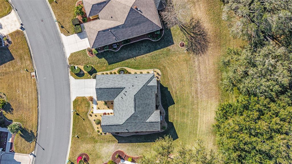 13146 Southeast 93rd Terrace Road Summerfield, FL 34491 - Photo 51 of 63 an aerial view of a house with a yard