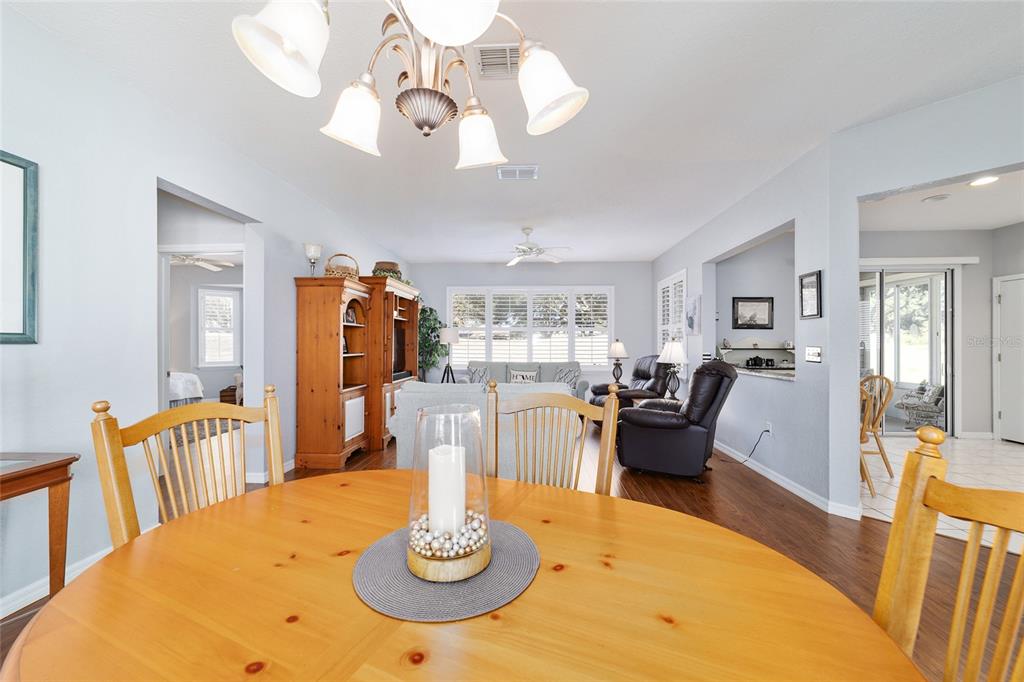 13146 Southeast 93rd Terrace Road Summerfield, FL 34491 - Photo 9 of 63 a view of a dining room with furniture