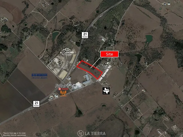 an aerial view of residential house with outdoor space