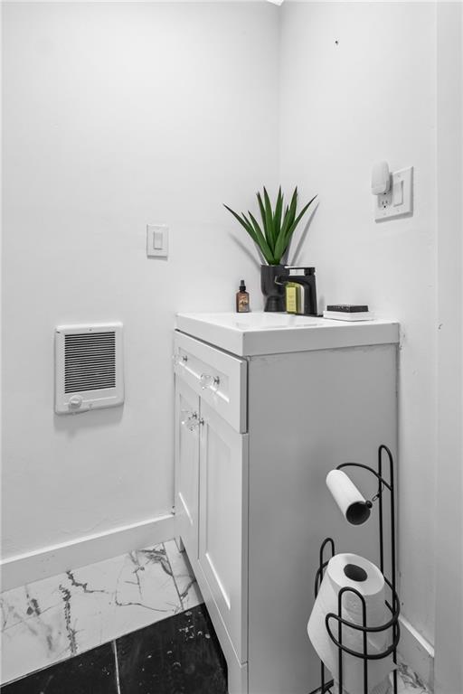419 Woodward Avenue McKees Rocks, PA 15136 - Photo 15 of 26 a white sink with potted plants on th wall