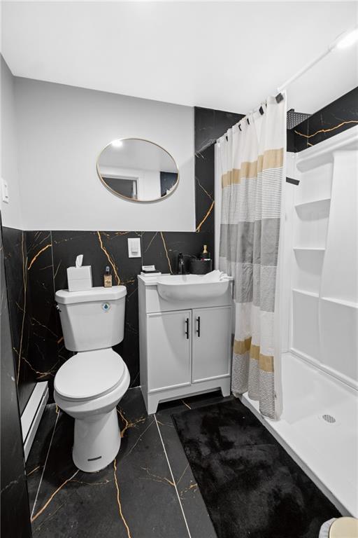 419 Woodward Avenue McKees Rocks, PA 15136 - Photo 21 of 26 a bathroom with a sink toilet and shower