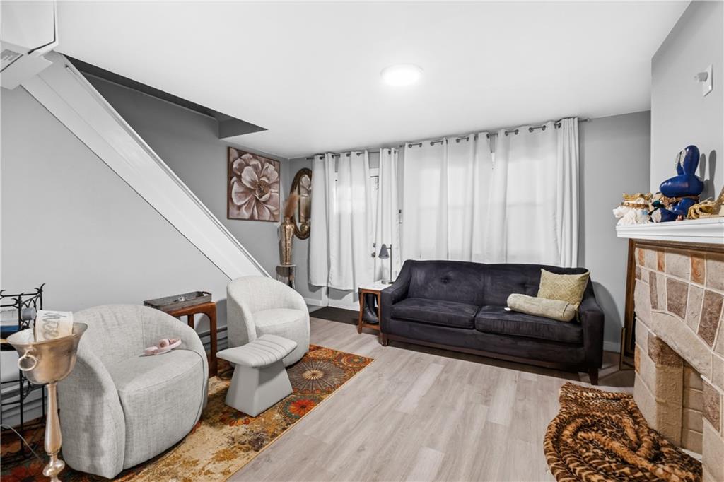 419 Woodward Avenue McKees Rocks, PA 15136 - Photo 7 of 26 a living room with furniture and a couch