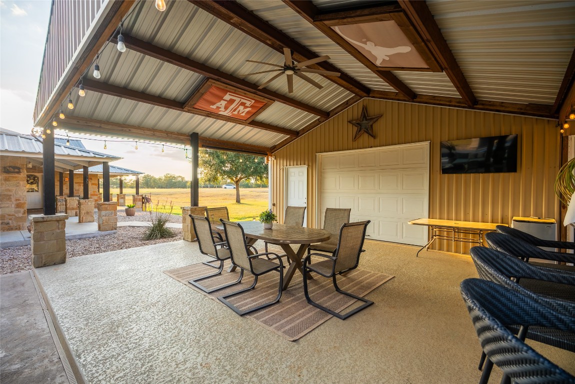 1000 Oil Field Road Lockhart, TX 78644 - Photo 13 of 39 a dining room with furniture and wooden floor