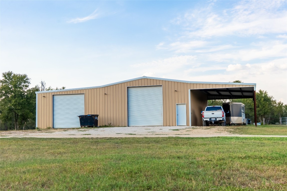 1000 Oil Field Road Lockhart, TX 78644 - Photo 14 of 39 a view of a house with a yard