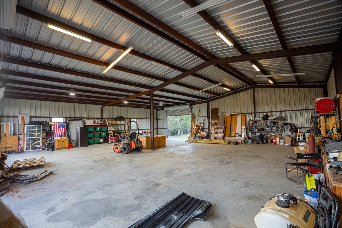 1000 Oil Field Road Lockhart, TX 78644 - Photo 15 of 39 a view of a garage with a bike and car