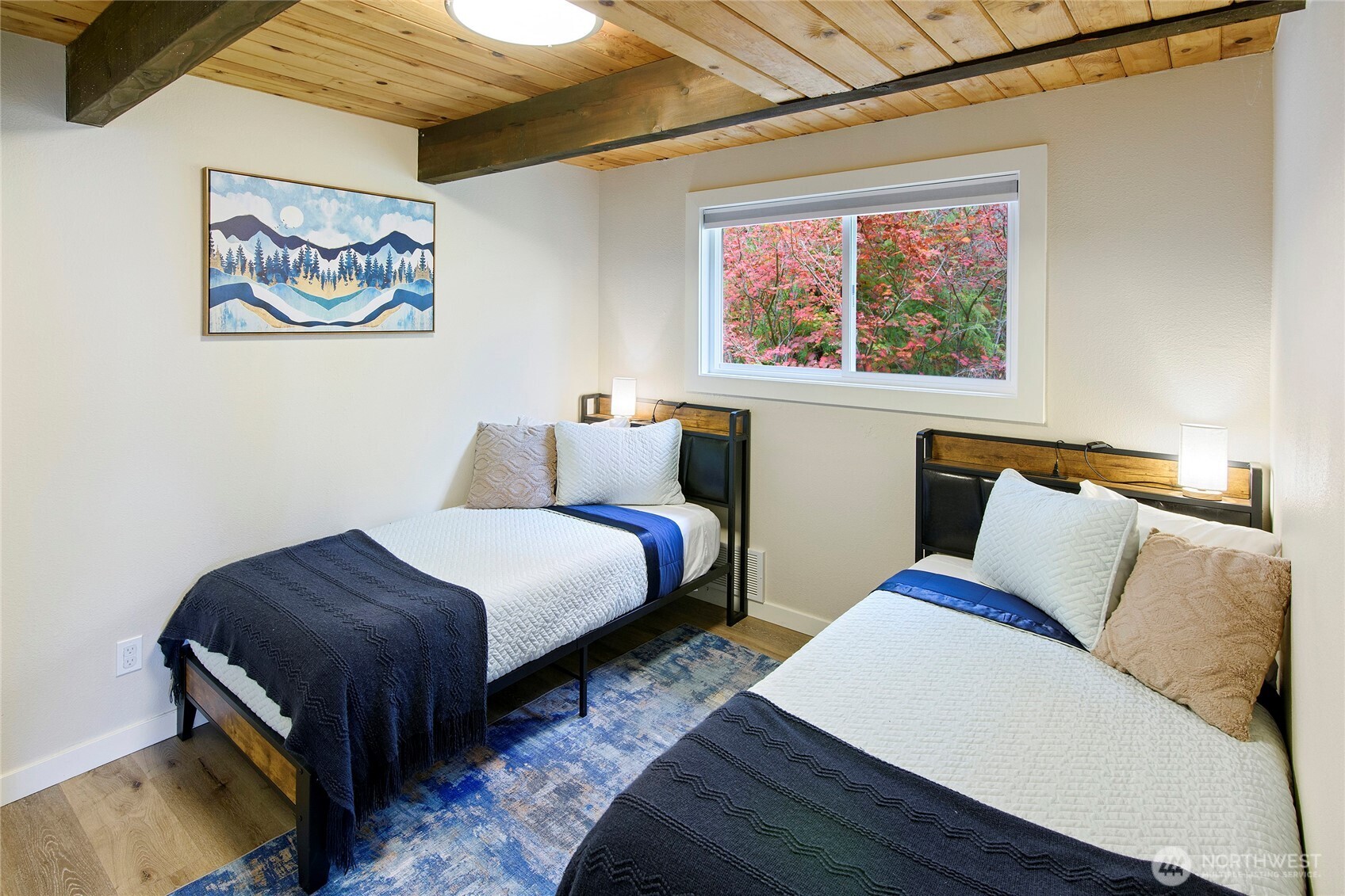304292 Highway 101 Brinnon, WA 98320 - Photo 11 of 33 a bedroom with double bed and a window