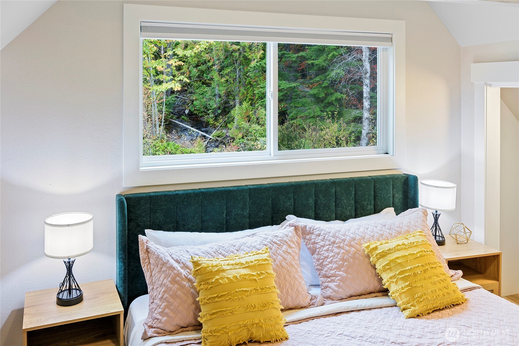 304292 Highway 101 Brinnon, WA 98320 - Photo 15 of 33 a living room with a couch and a large window