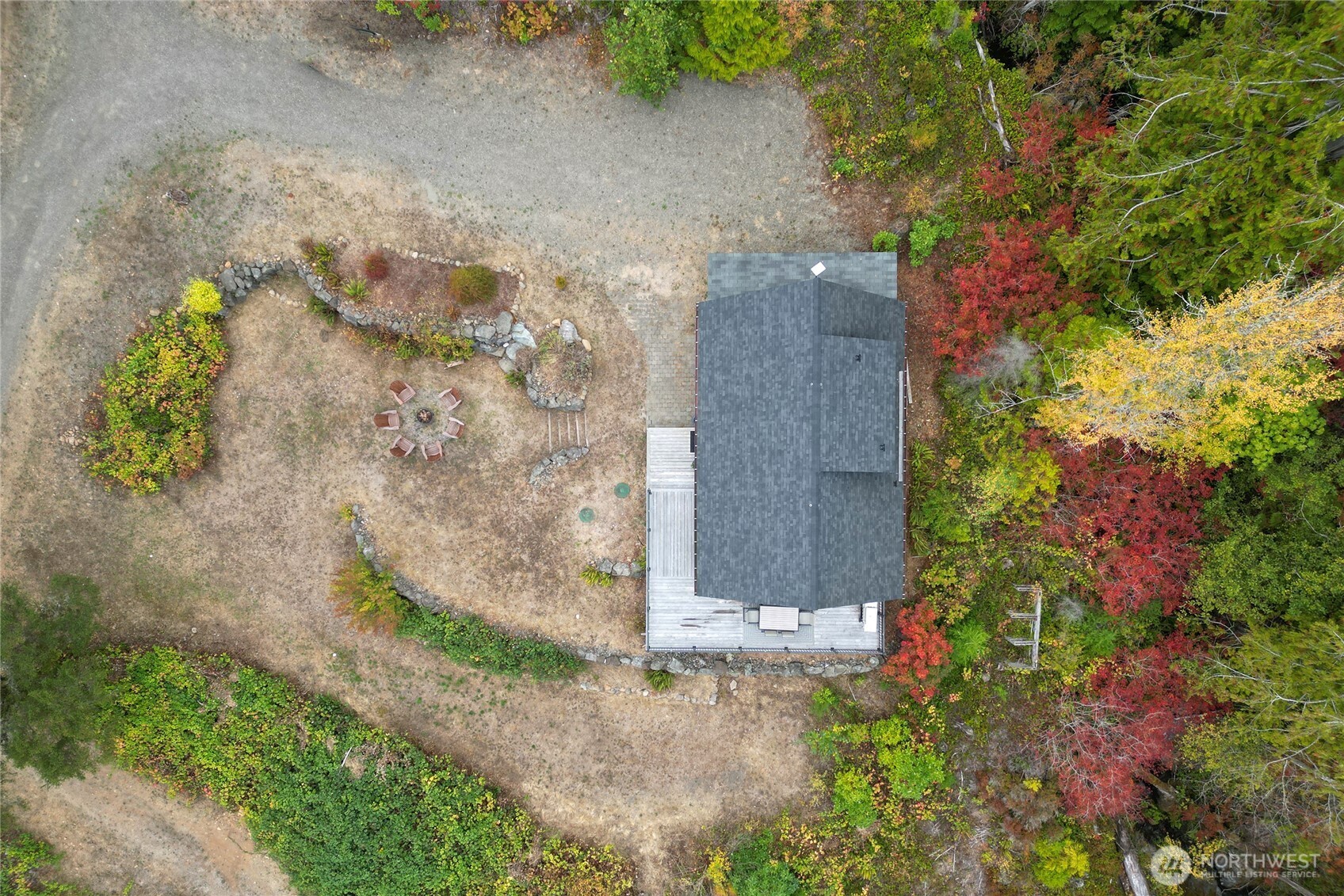 304292 Highway 101 Brinnon, WA 98320 - Photo 22 of 33 front view of a house with a yard
