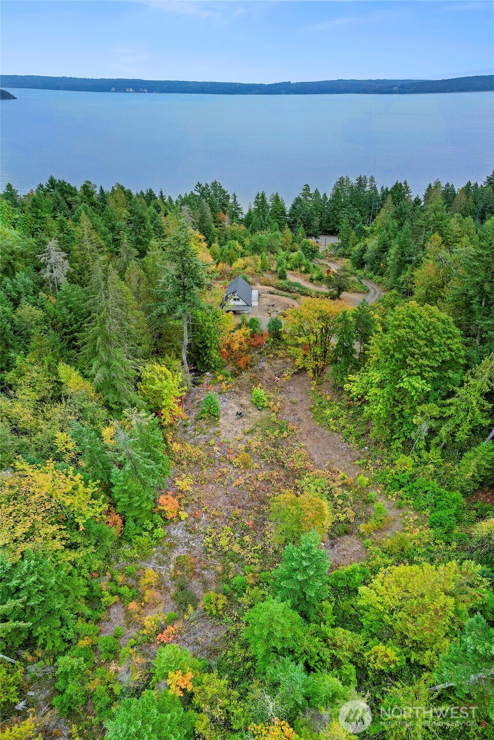 304292 Highway 101 Brinnon, WA 98320 - Photo 28 of 33 a view of a garden with a lake