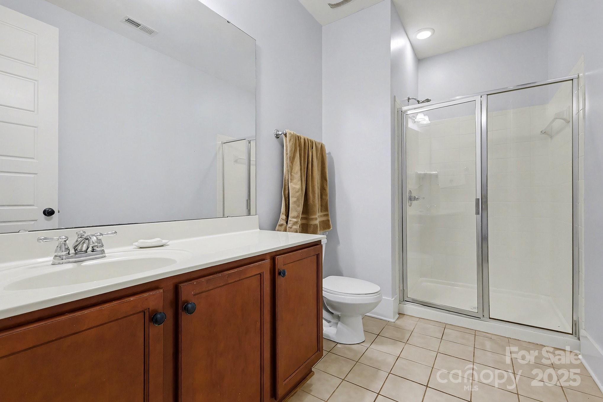 797 Herrons Ferry Road Rock Hill, SC 29730 - Photo 18 of 34 a bathroom with a sink a toilet and shower