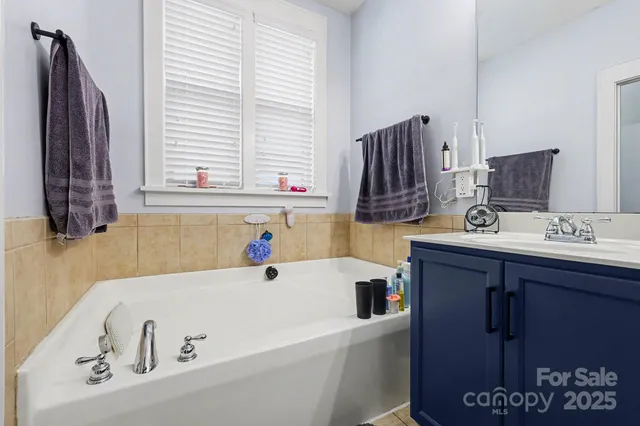 a bathroom with a sink and a bathtub