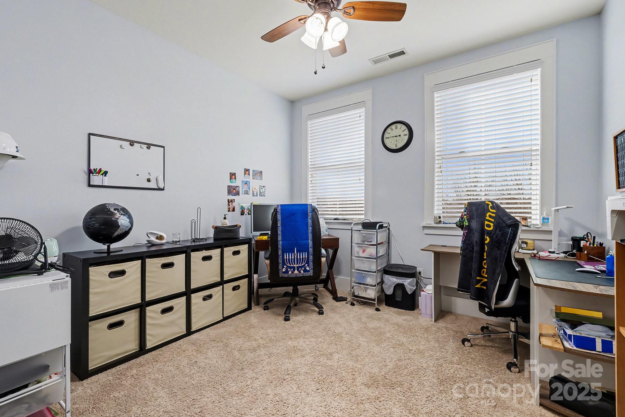 797 Herrons Ferry Road Rock Hill, SC 29730 - Photo 24 of 34 a view of a workspace with furniture and a window