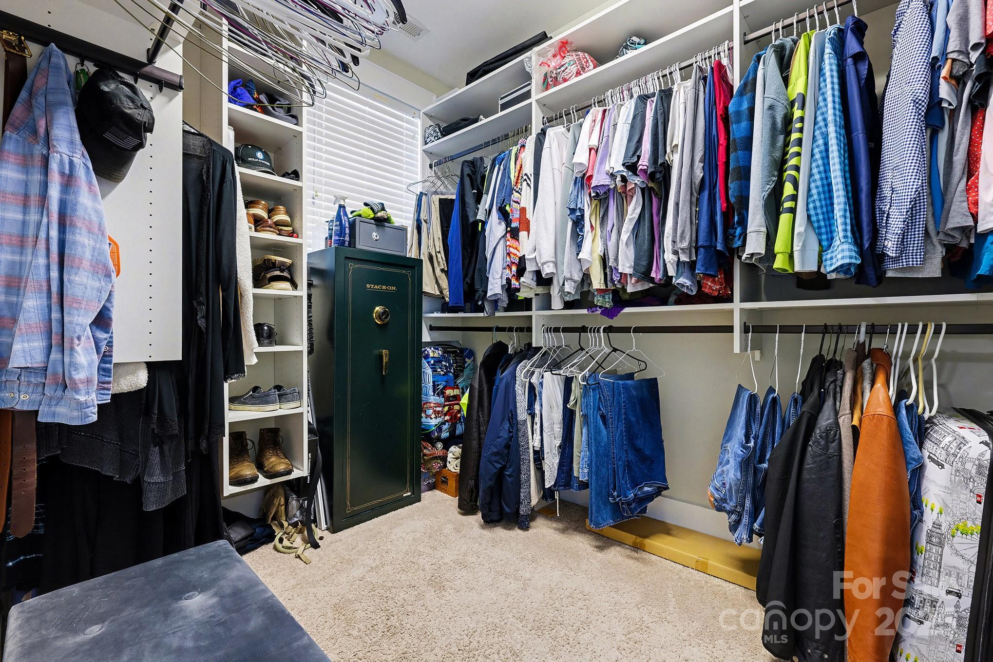 797 Herrons Ferry Road Rock Hill, SC 29730 - Photo 25 of 34 a view of walk in closet with clothes and shoes