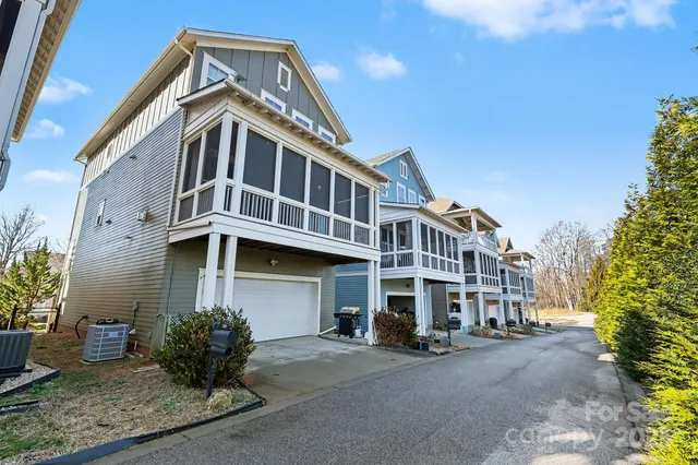a view of a building with a yard
