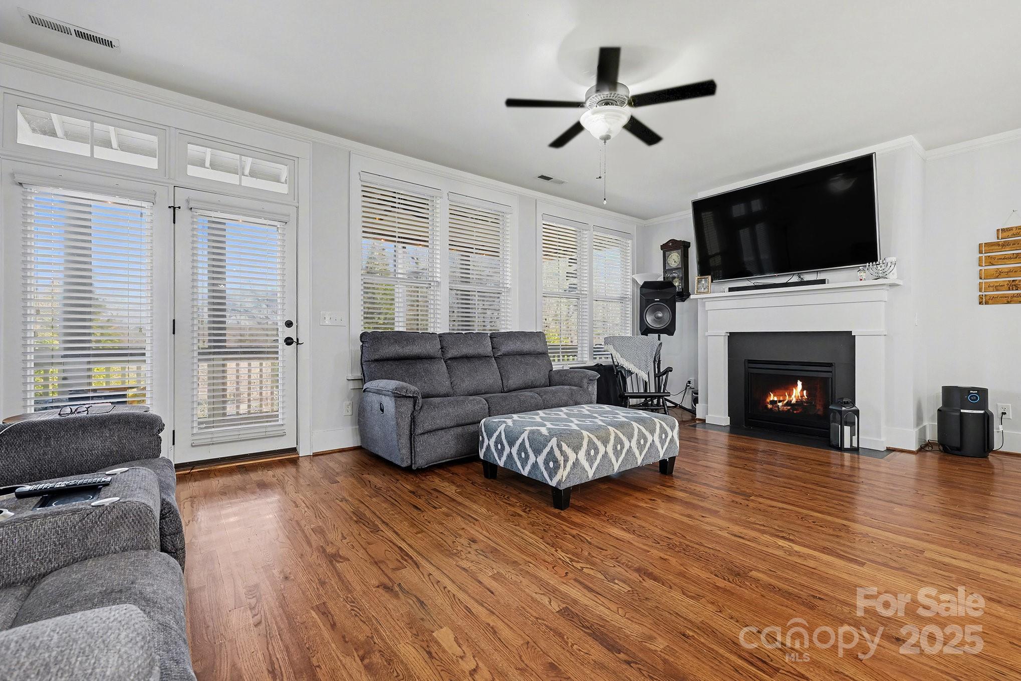 797 Herrons Ferry Road Rock Hill, SC 29730 - Photo 6 of 34 a living room with furniture fireplace and flat screen tv