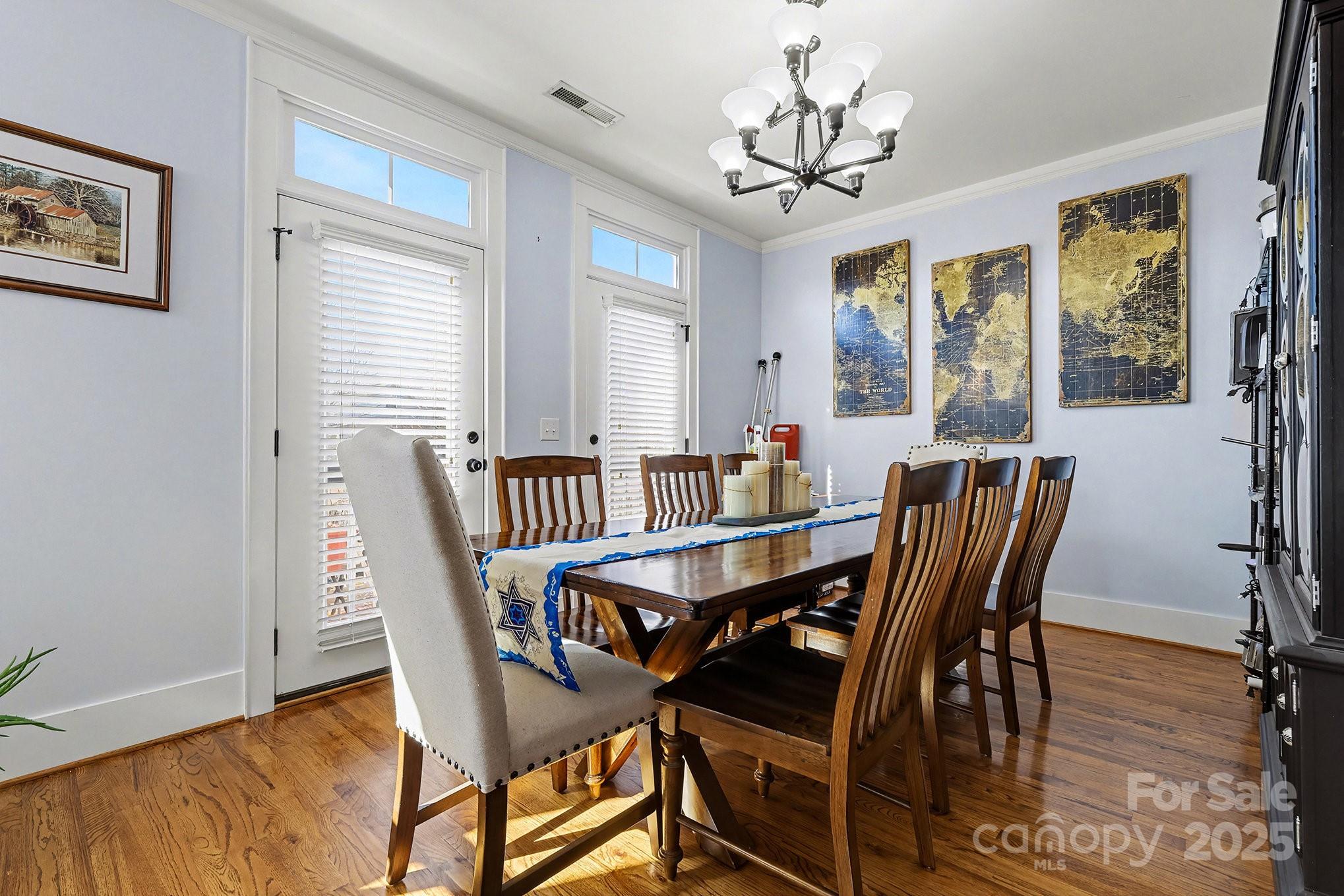 797 Herrons Ferry Road Rock Hill, SC 29730 - Photo 10 of 34 a view of a dining room with furniture window and wooden floor