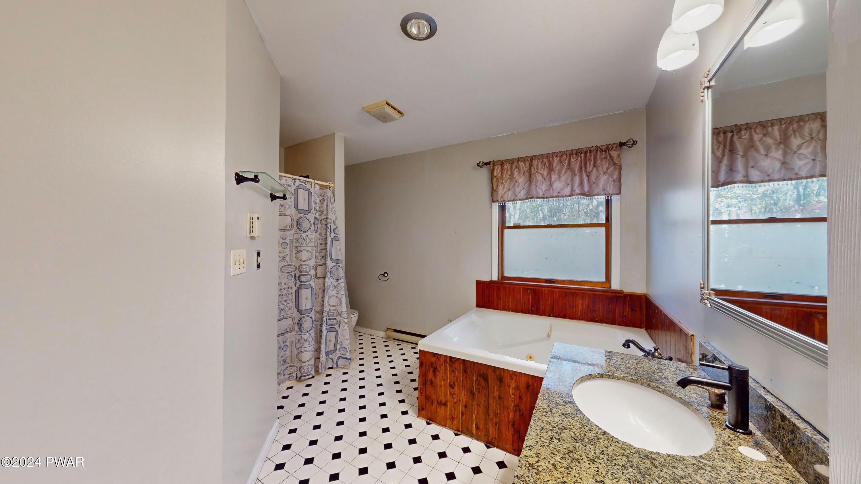 102 Maple Ridge Road Milford, PA 18337 - Photo 17 of 52 a bathroom with a sink toilet tub and shower