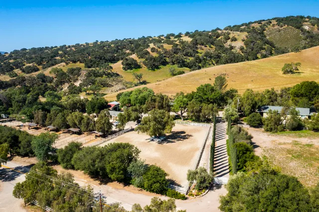 a view of a backyard of a house