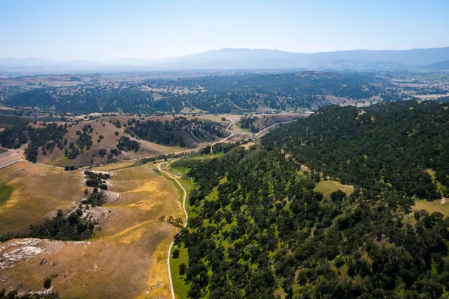 a view of an outdoor space with mountain view